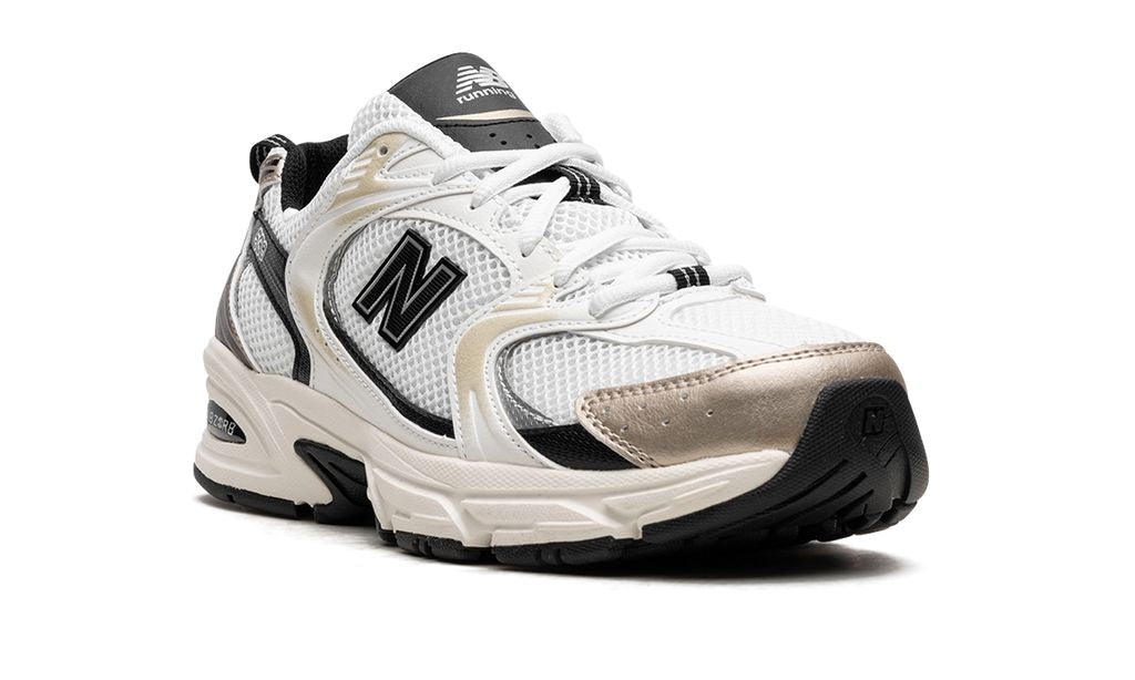 New Balance 530 Blanco Dorado Negro