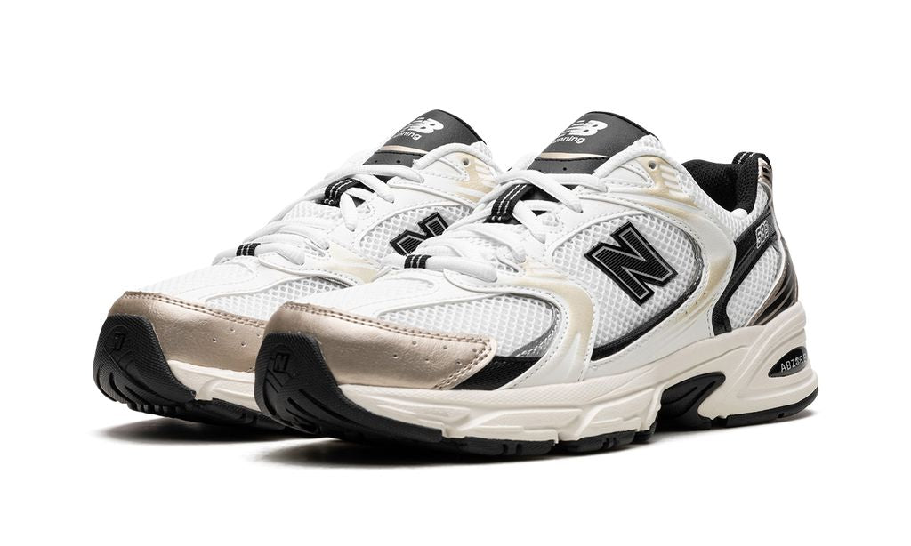 New Balance 530 Blanco Dorado Negro