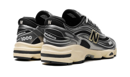 New Balance 1000 Plata Metálico