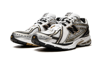 New Balance 1906R "Blanco/Dorado"