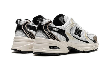 New Balance 530 Blanco Dorado Negro 